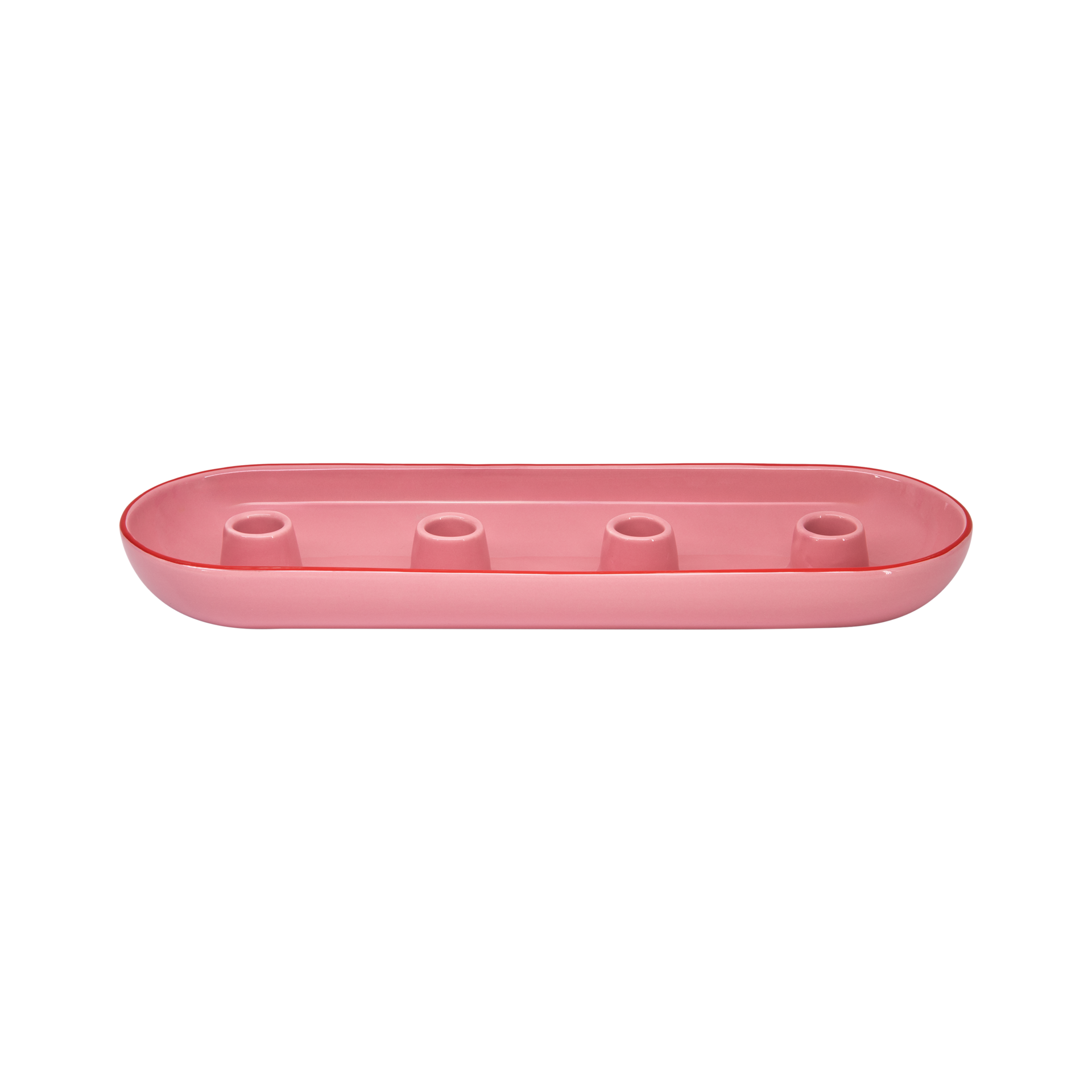 Coupe ovale rose pour couronne de l'Avent, en céramique de dolomite brillante, avec quatre supports intégrés pour bougies cylindriques. Le bord supérieur a une discrète bordure rouge contrastée. Vue oblique du dessus.