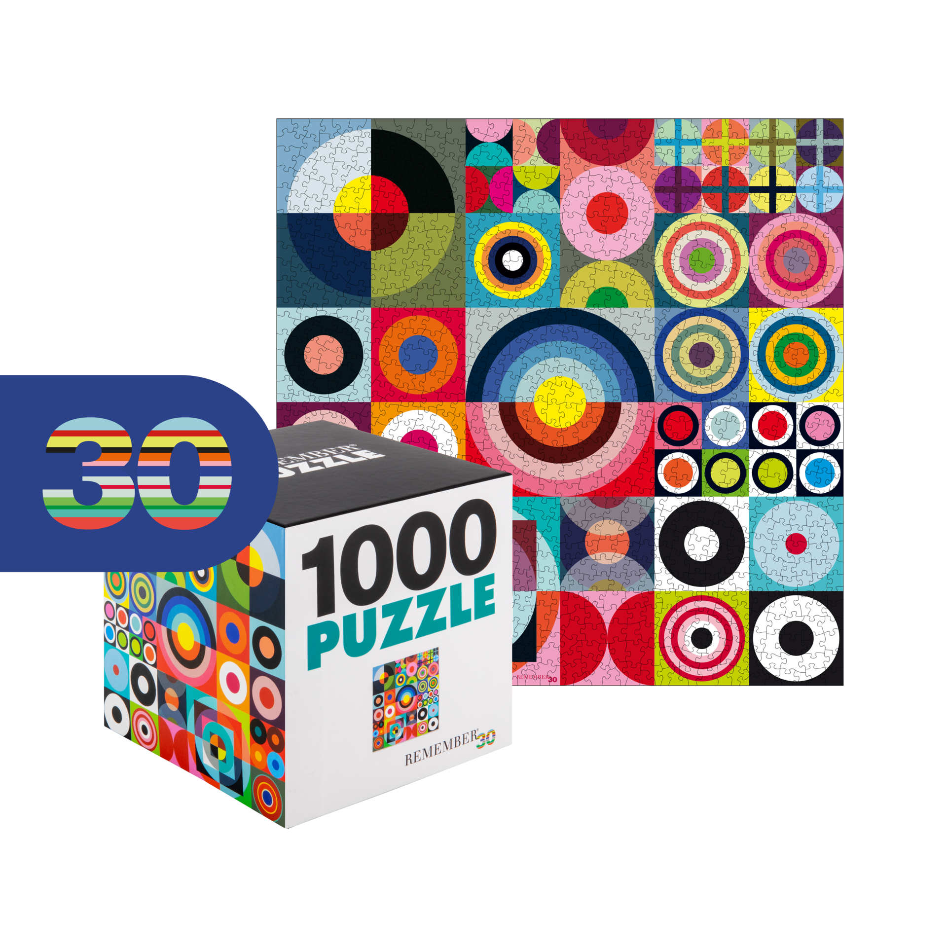 Puzzle REMEMBER® 30 de 1 000 pièces terminé : grille abstraite aux couleurs vives composée de cercles et de demi-cercles rouges, bleus, jaunes, verts, roses et noirs. À côté, une boîte blanche portant l'inscription « 1000 PUZZLE ».
