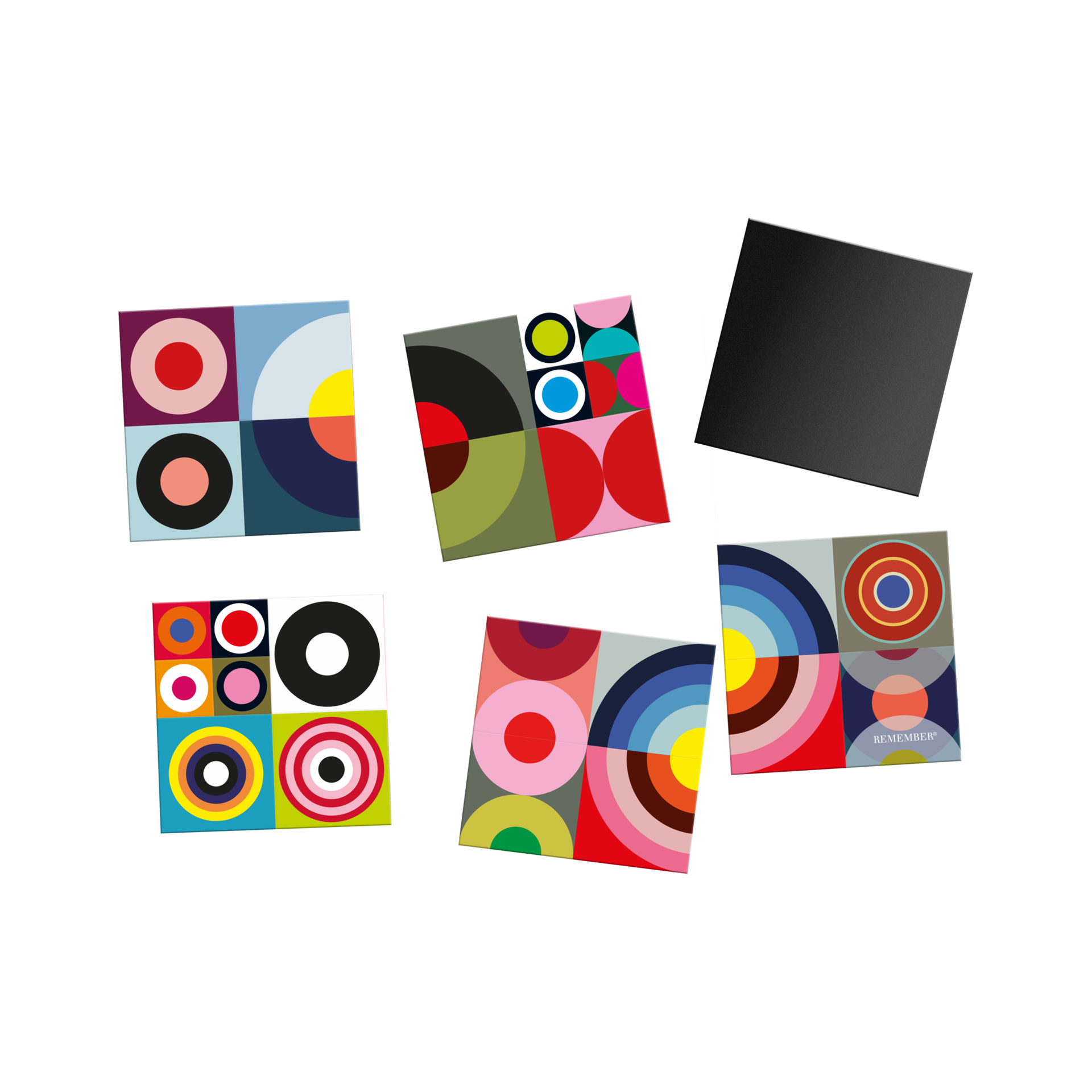 Six aimants de réfrigérateur souples Ronda, avec motifs abstraits colorés sur fond blanc. Plaquettes carrées décorées de cercles et d’arcs vifs, combinables seules ou pour former le motif « REMEMBER ». L’un est noir.