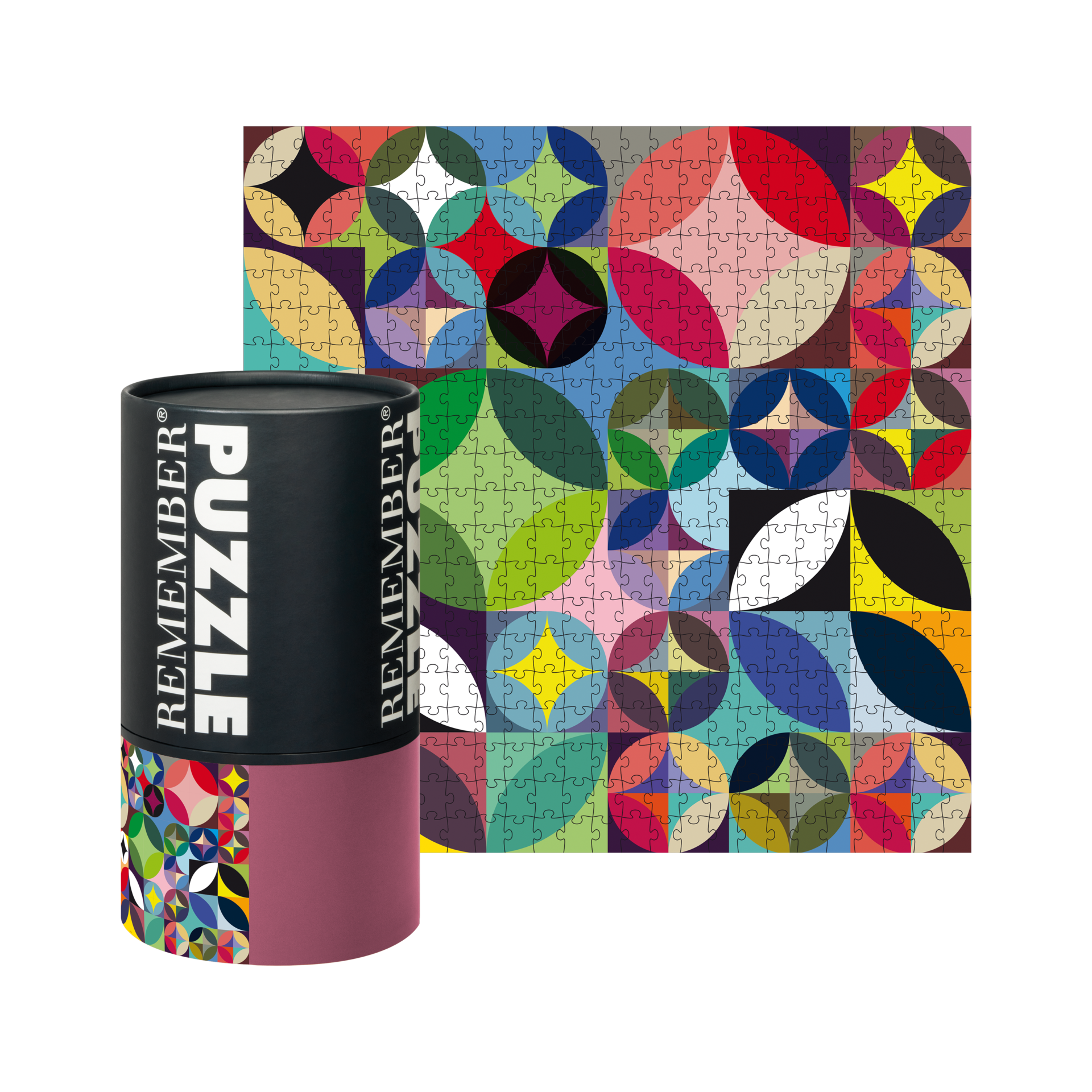 500-Teile-Puzzle „Rosetta“: buntes geometrisches Kreis- und Segmentmuster in Rot, Blau, Grün, Gelb, Violett. Daneben die schwarze zylindrische Verpackung.