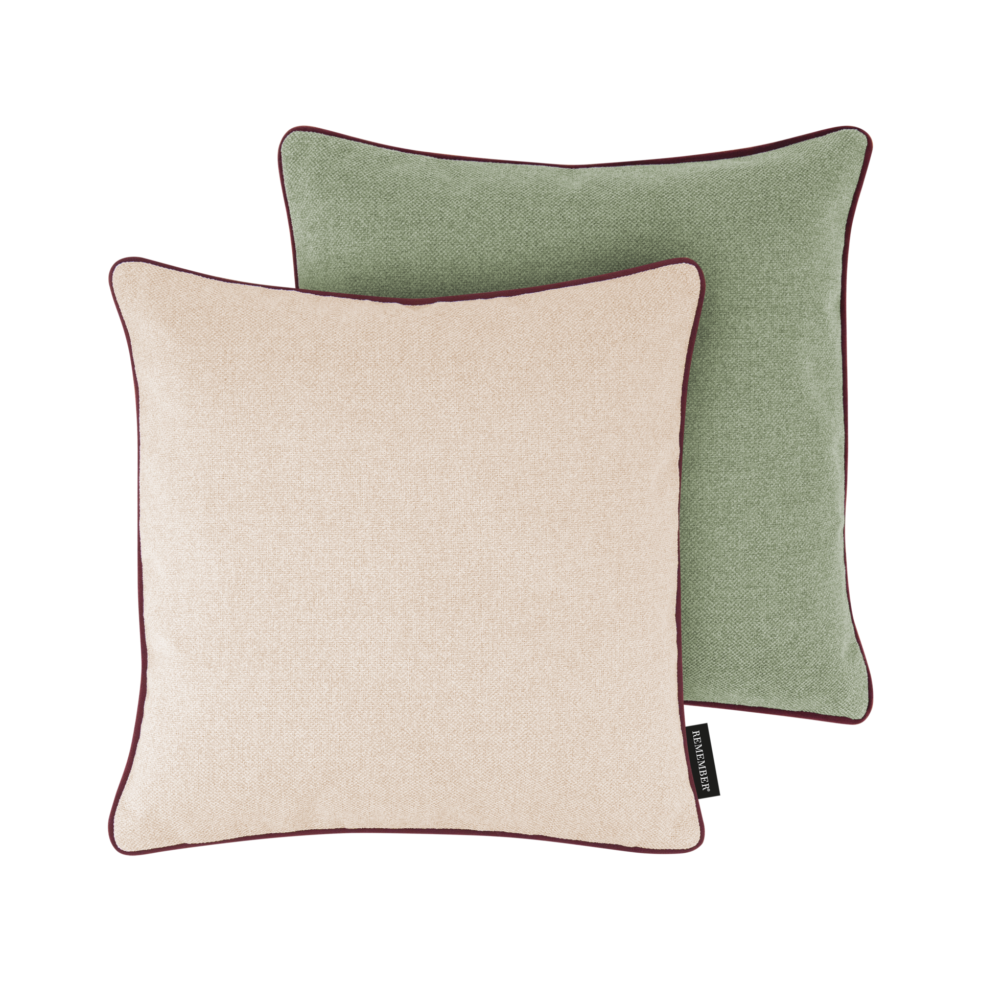 Zwei quadratische Kissen: eines in Beige mit weinroter Paspel, das andere in Grün mit weinroter Paspel, beide auf weißem Grund.
