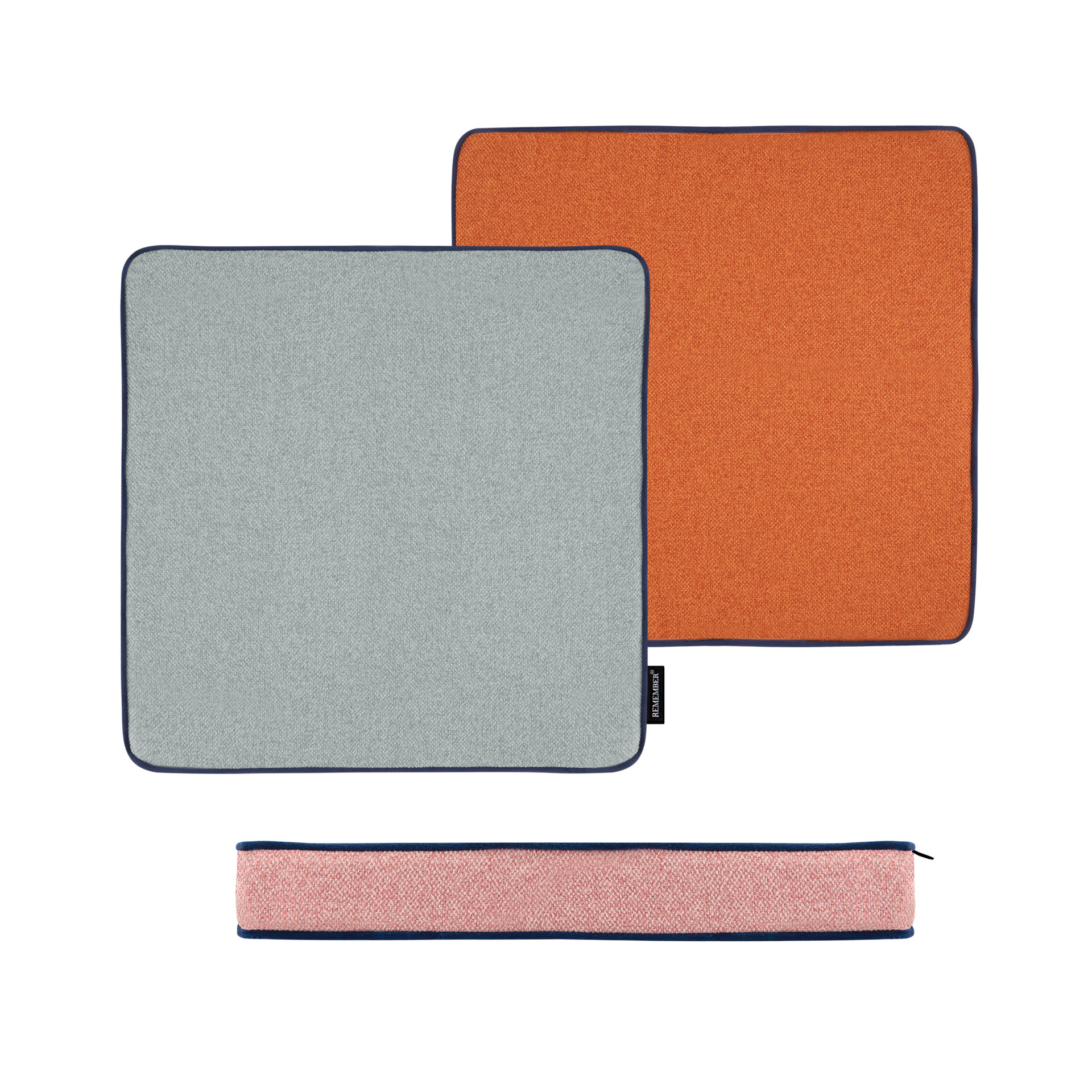 Quadratische Sitzkissen, hellgrau, orange und rosa, mit dunkelblauer Paspel. Zwei Kissen liegen flach, eines ist hochkant sichtbar.