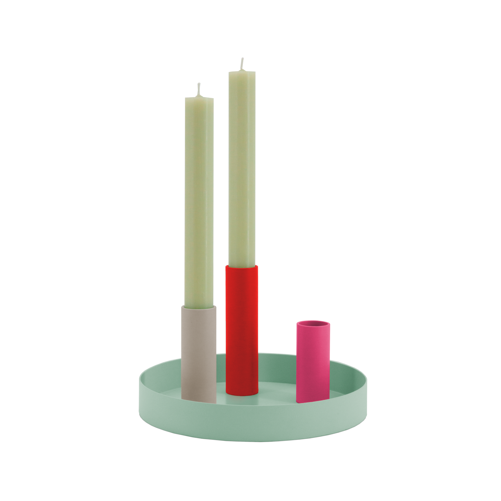 Runder, mintfarbener Magnet-Kerzenhalter 'Luna Mini' mit drei farbigen Haltern (rot, rosa, beige) und zwei beigen Kerzen.