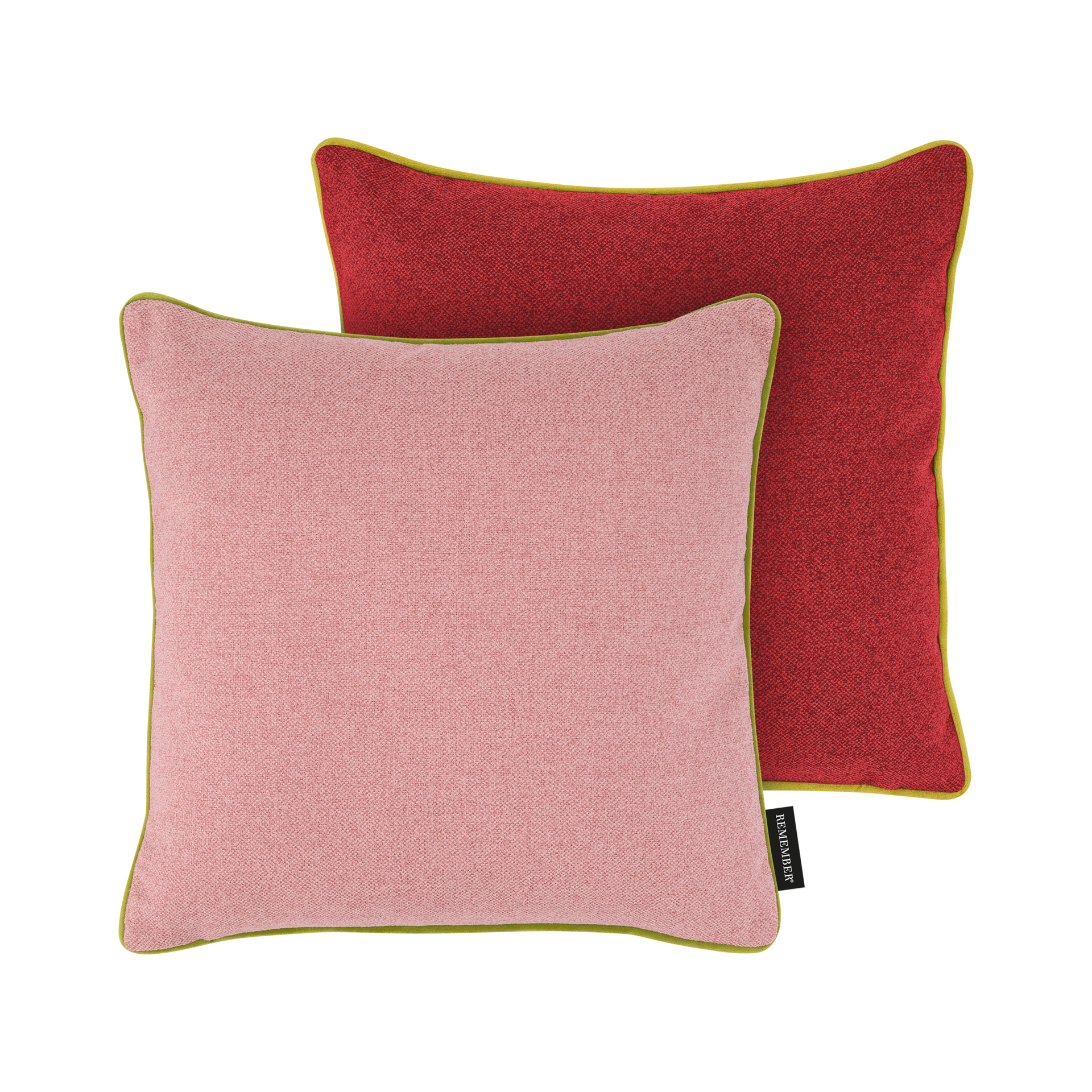 Zwei Kissen in Rosa und Cranberry-Rot mit grüner Paspel liegen übereinander. Das vordere Kissen ist rosa und leicht nach links geneigt.