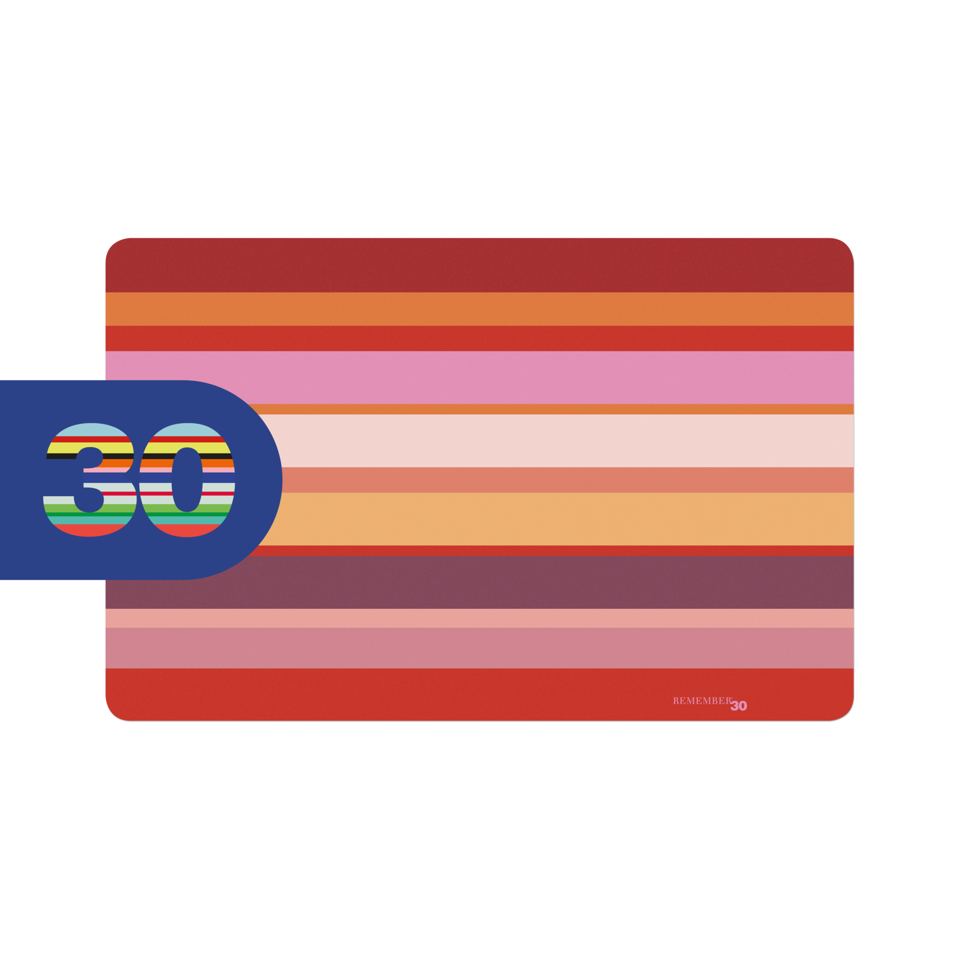 Rechteckiges Tischset Marrakesch mit bunten Querstreifen und abgerundeten Ecken, links davon eine blaue Lasche mit der Aufschrift "30" in Regenbogenfarben.