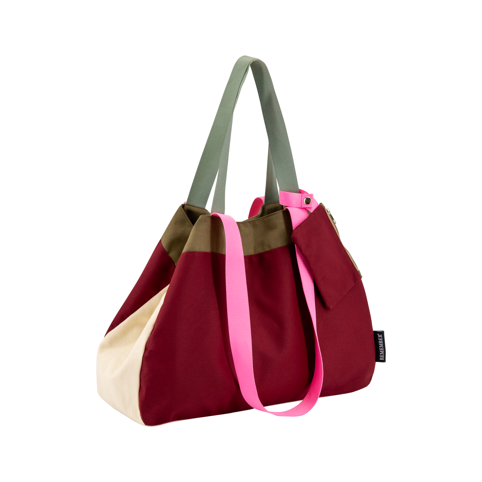 Freigestellte Canvas Tasche 'Emma' in Weinrot, Beige und Olivgrün mit pinken Details. Tragehenkel in Olivgrün, ein abnehmbares Täschchen ist an der Seite befestigt.